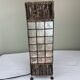 Capiz shell lamp and woven twigs