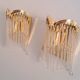 Pair of gold metal wall lights with tassels