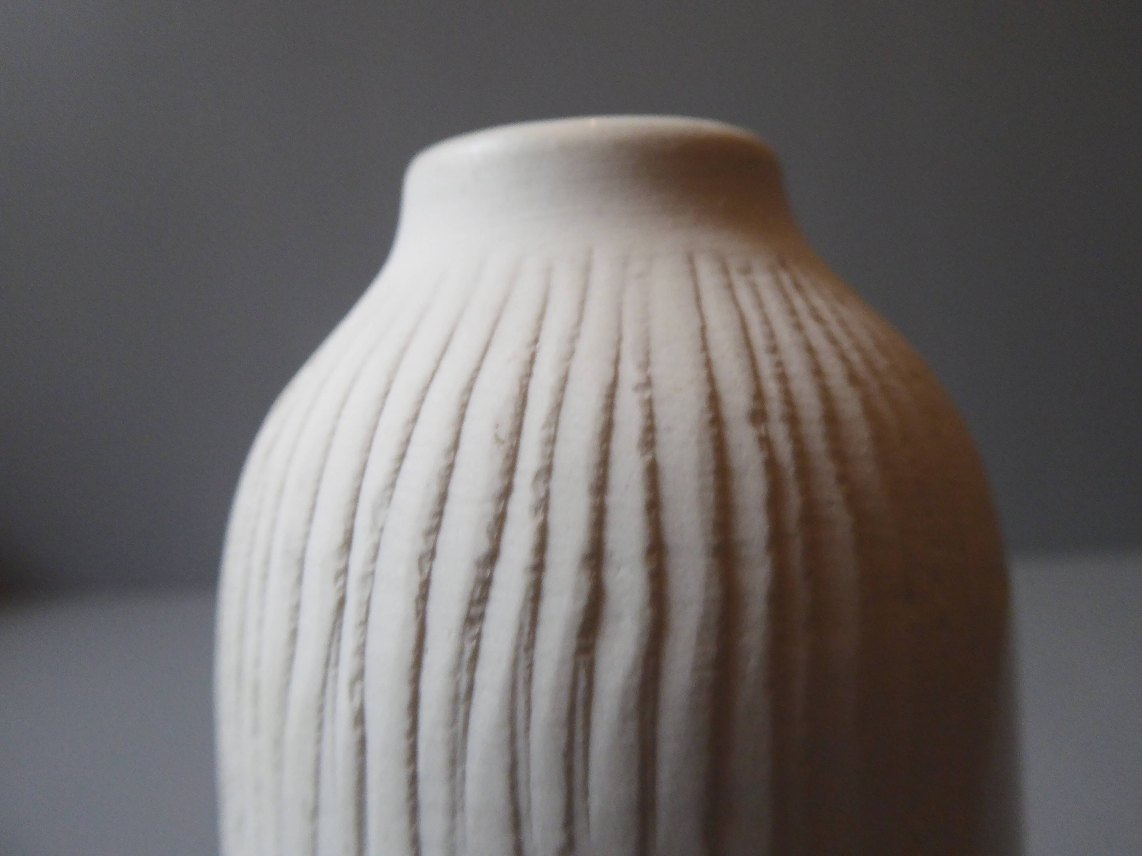 Porcelain vase and biscuit decorated with flowers