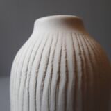 Porcelain vase and biscuit decorated with flowers