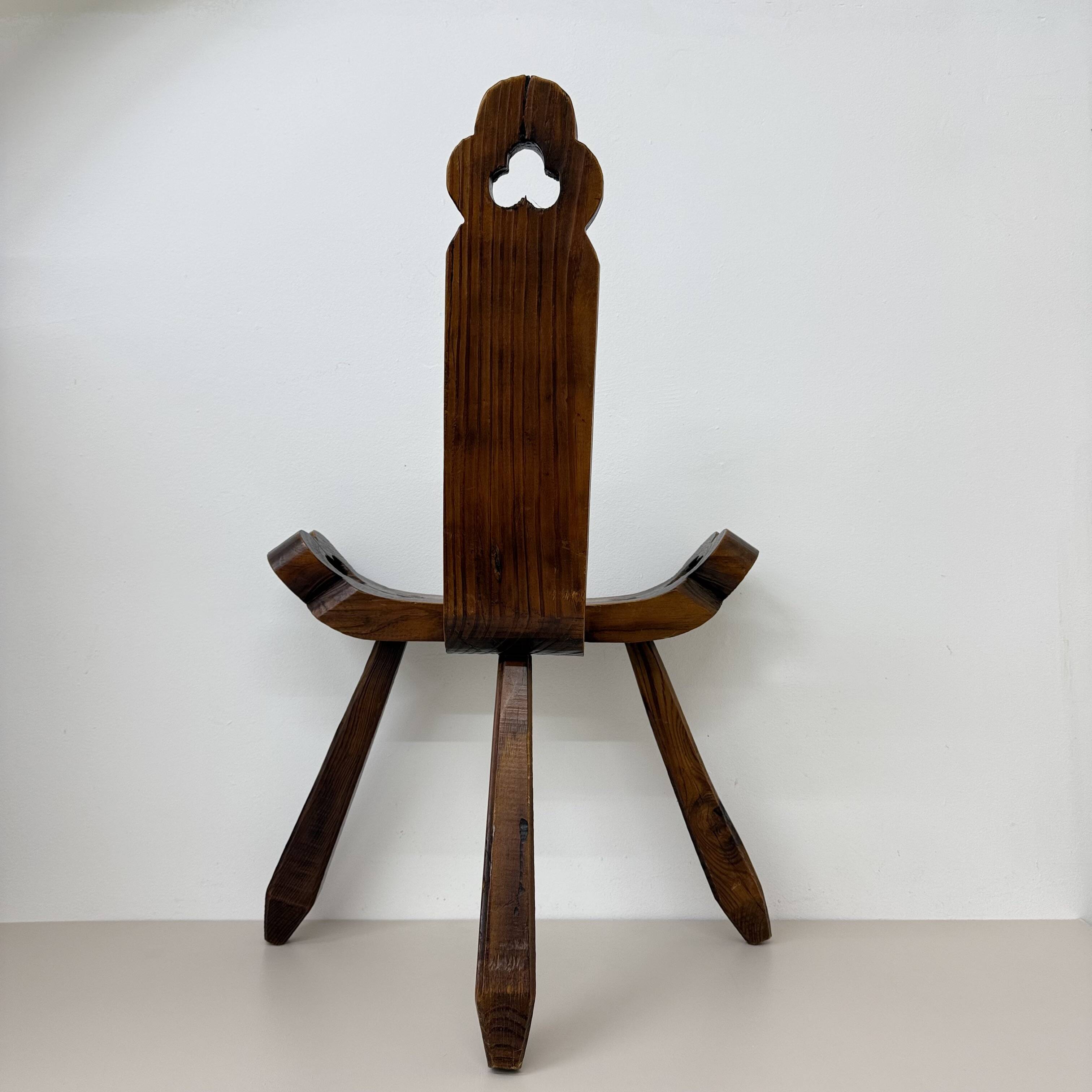 Brutalist hand carved oak Spanish tripod chair , 1970s