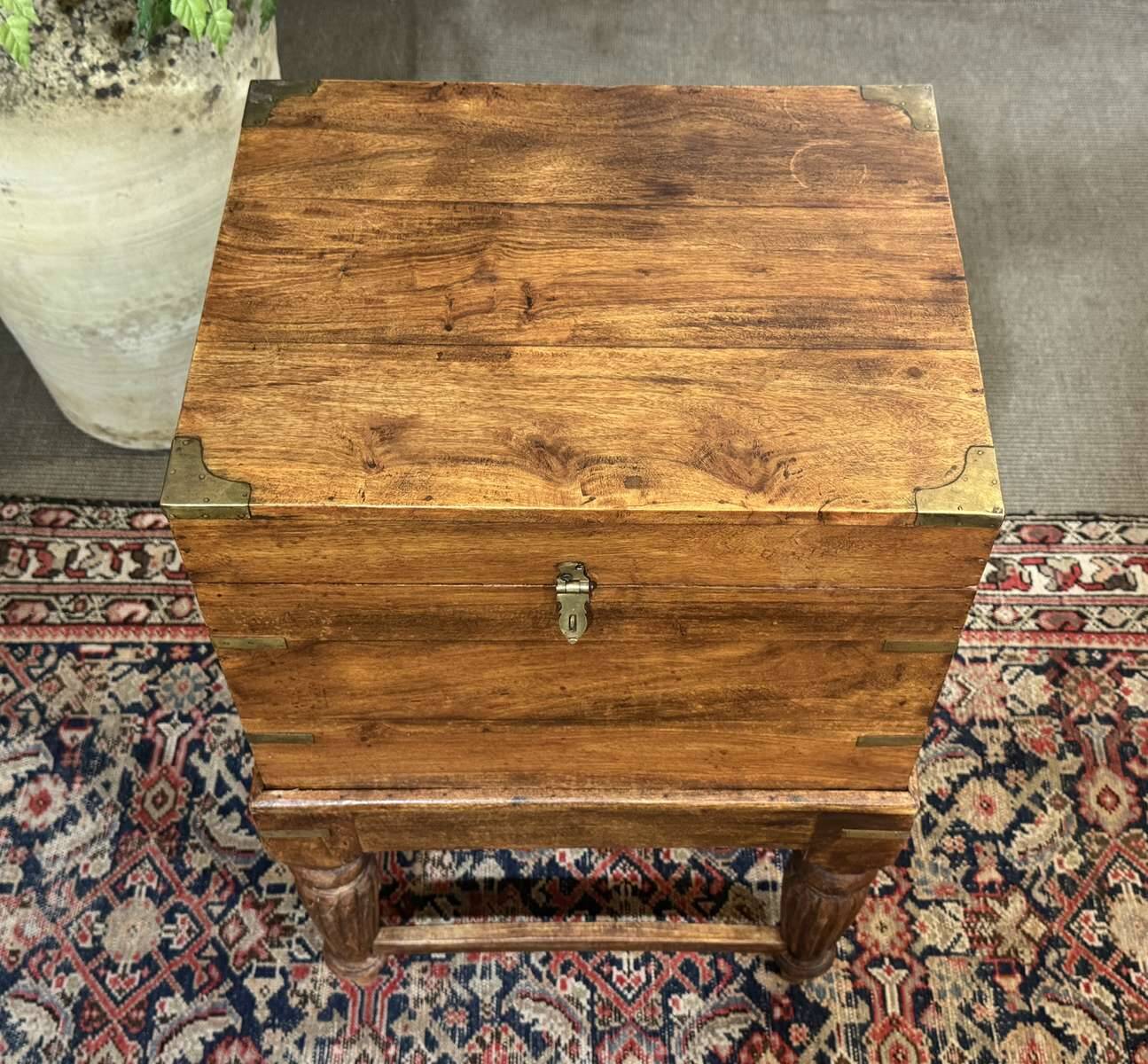 Teak bottle cabinet on legs in marine style