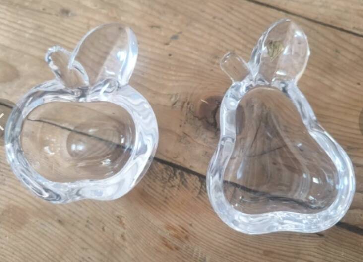 Set of 2 crystal ashtrays in apple and pear shapes.