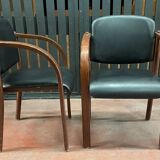 Pair of wooden and leatherette armchairs from the 80s