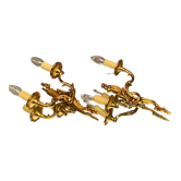 Pair of Louis XV style gilded bronze sconces