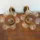 Wall lamps in gilded metal, verrine in the shape of amber glass corollas, 70s