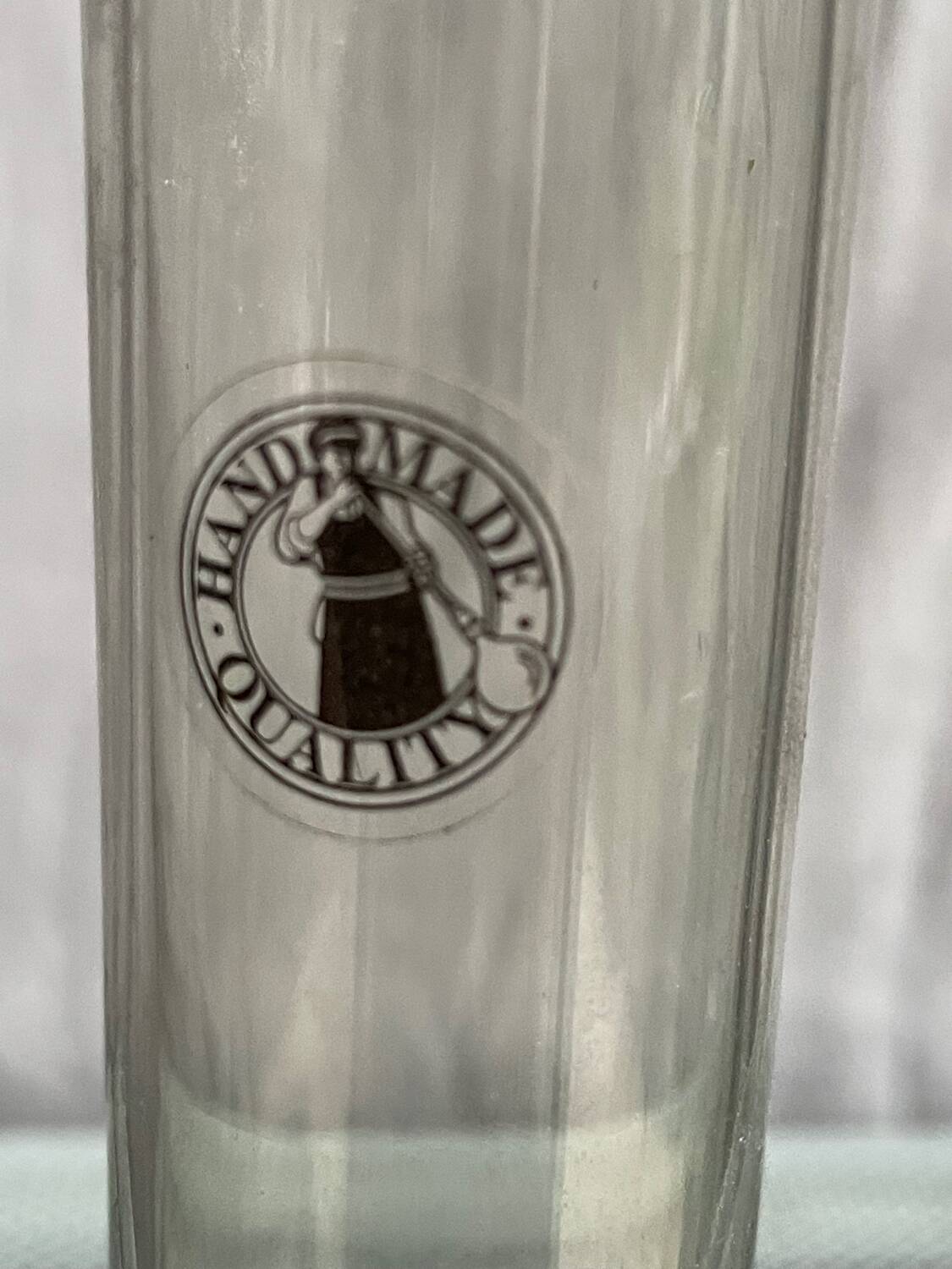 Old transparent soliflore tube vase