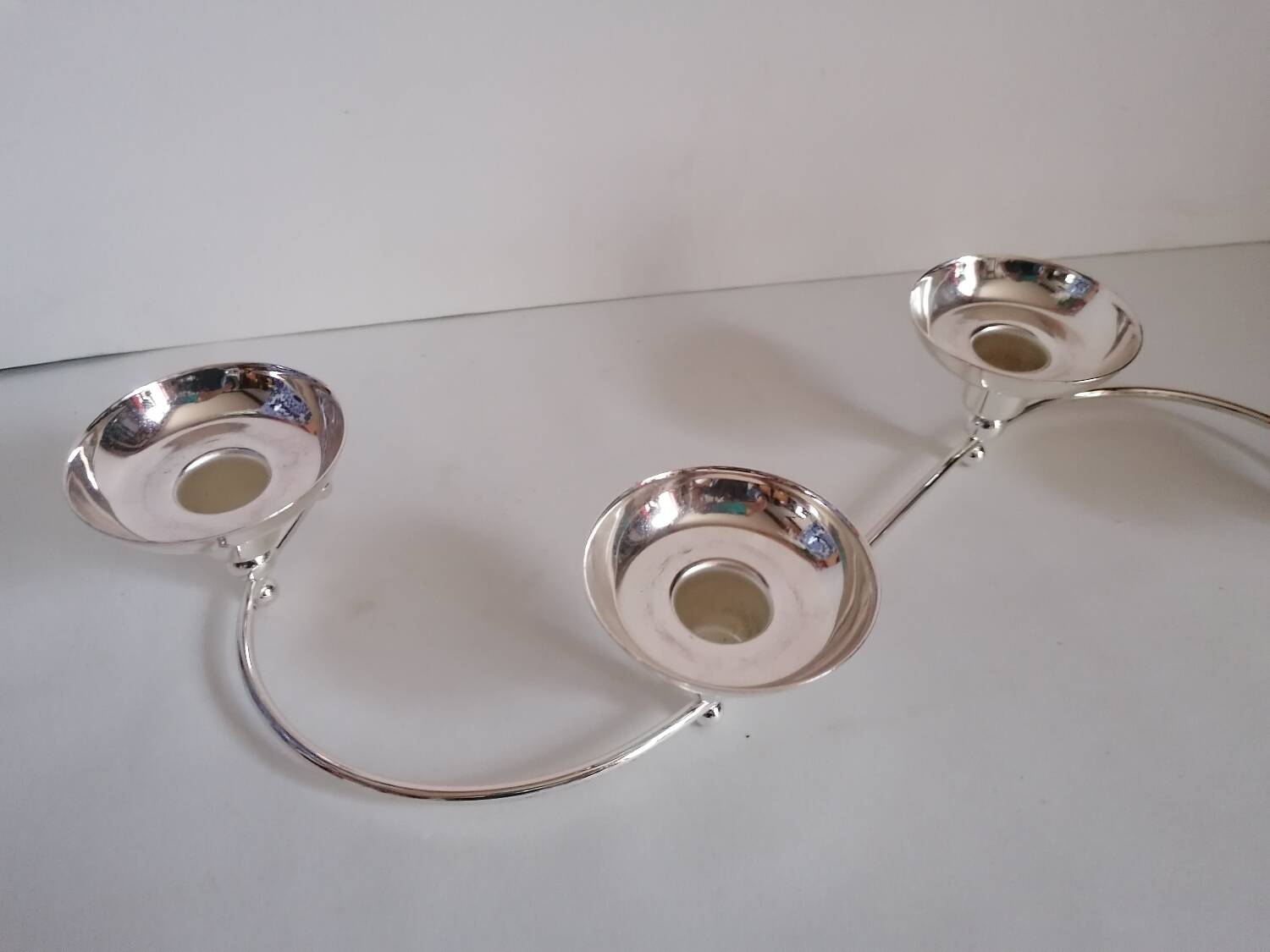 4-light silver metal candle holder