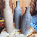 3 terracotta bottles