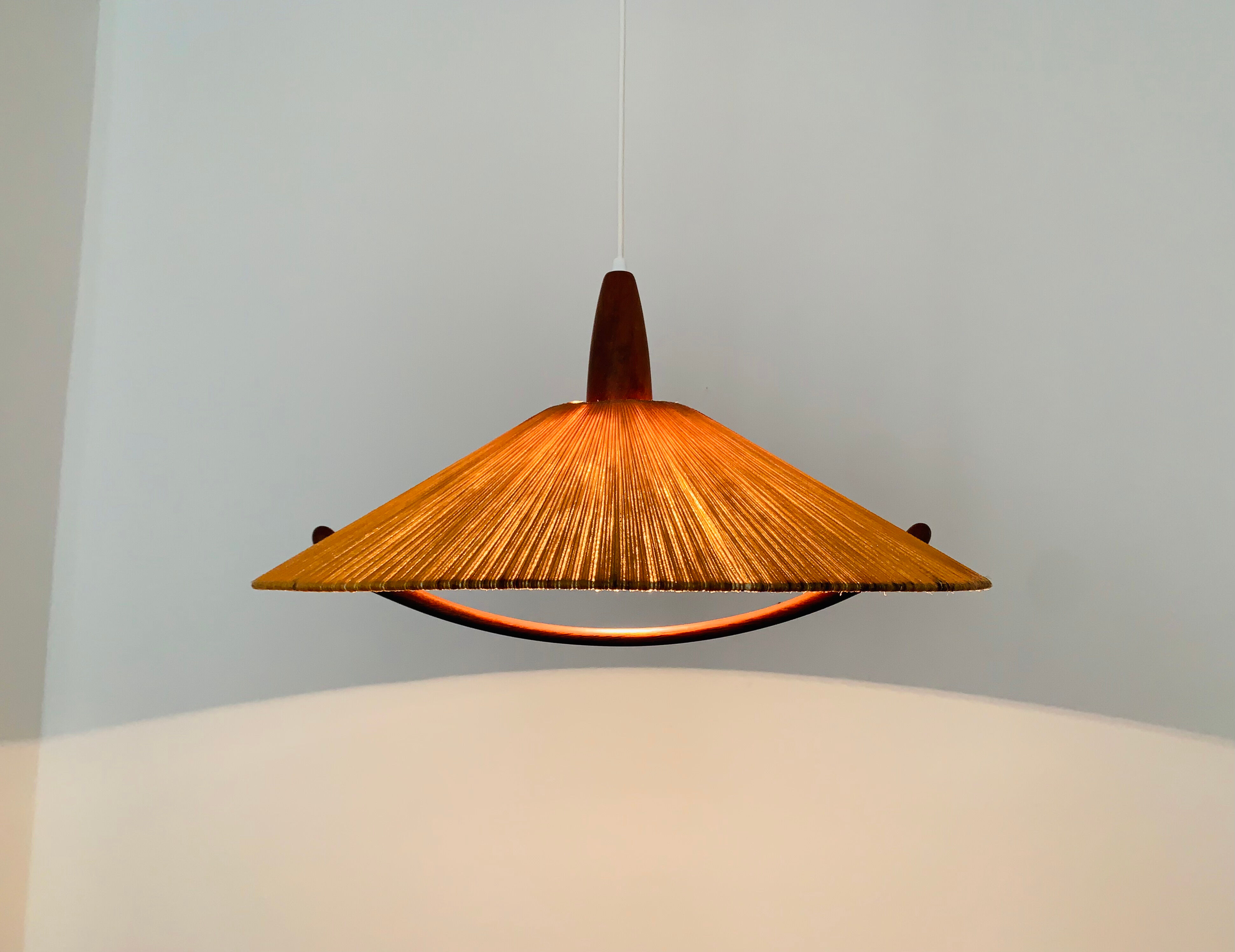 Raffia bast and teak pendant lamp by Temde
