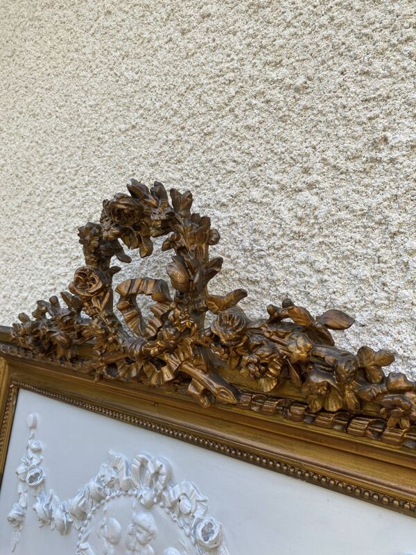 Miroir XIXème style Louis XVI en bois doré à la feuille d'or, 74x150cm