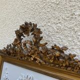 19th century Louis XVI style mirror in wood gilded with gold leaf, 74x150cm