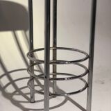 Contemporary aluminum stool and green/blue velvet