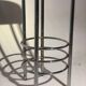 Contemporary aluminum stool and green/blue velvet