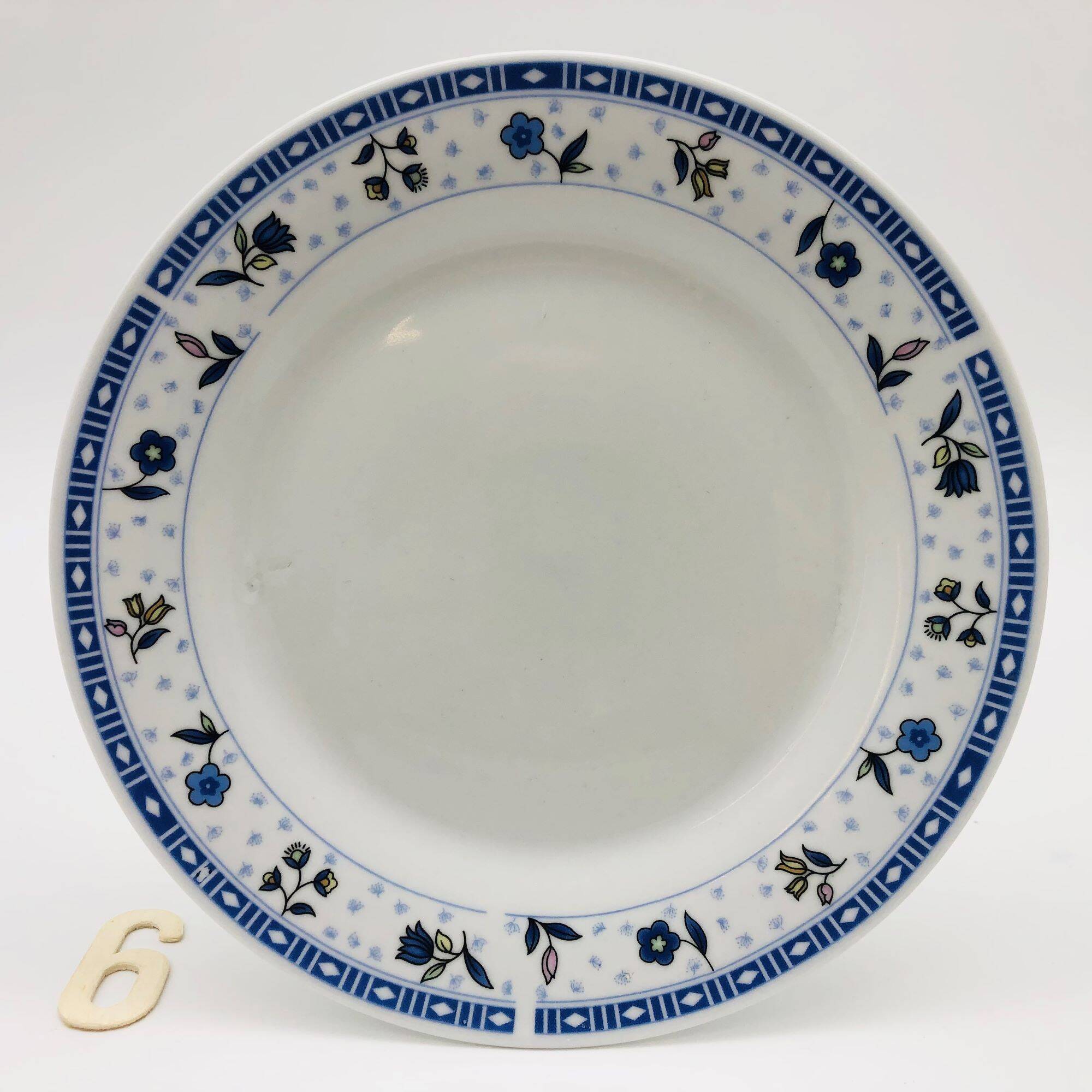 6 “Chriss G. Collection” porcelain dessert plates.