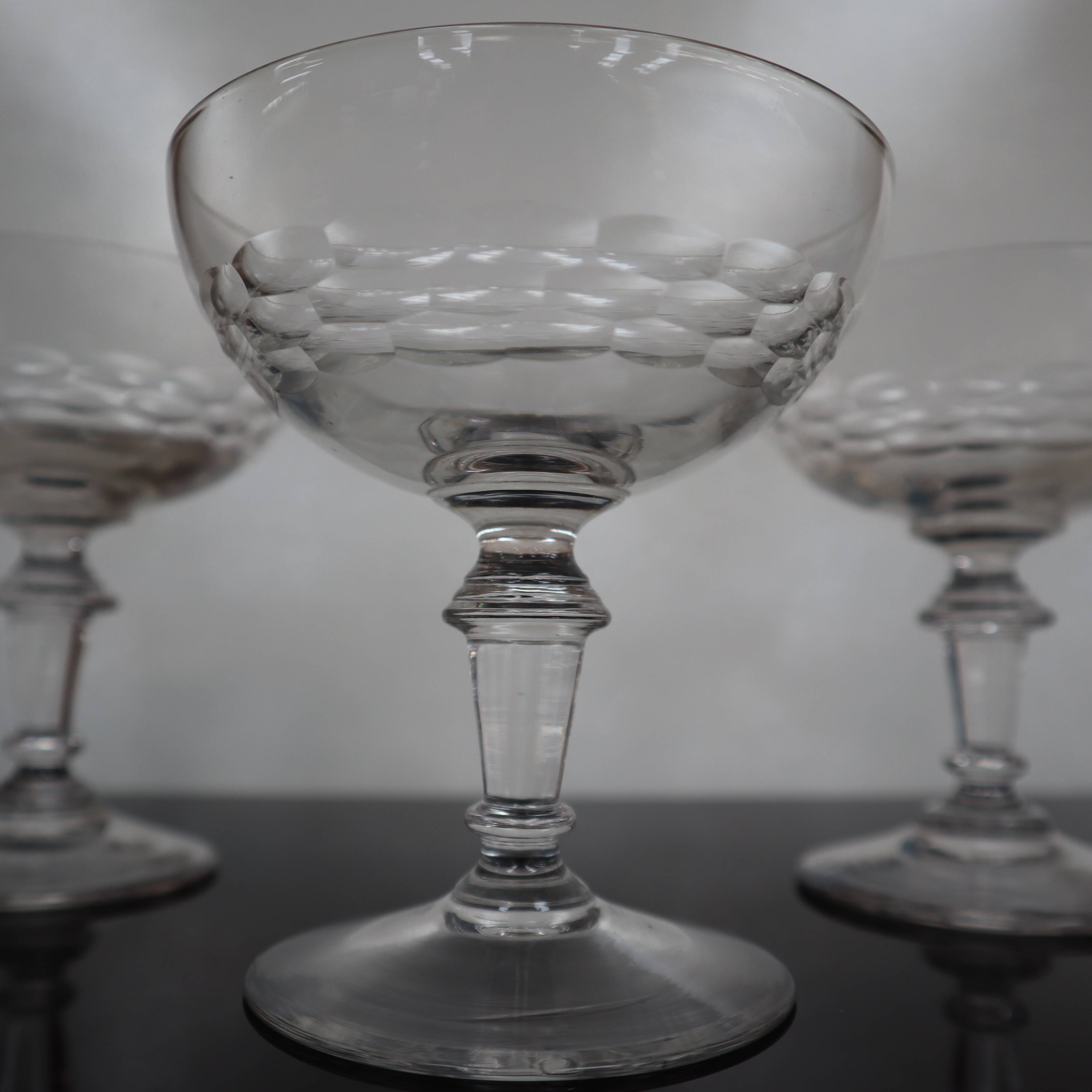 Set of 4 20th century chiseled glass champagne glasses