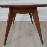 Coffee table with compass feet