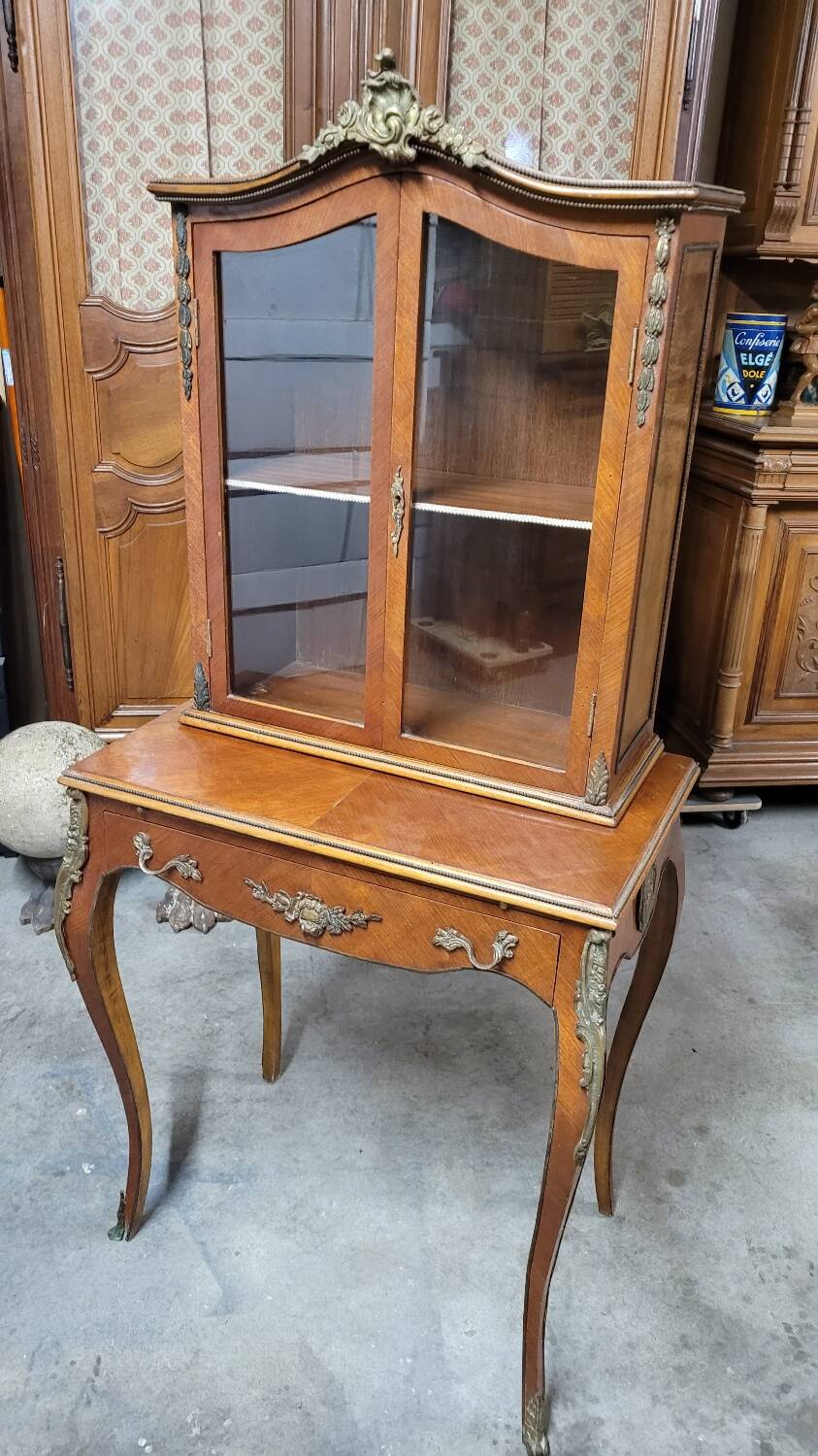 Louis XV bonheur du jour in rosewood marquetry decorated with bronze.