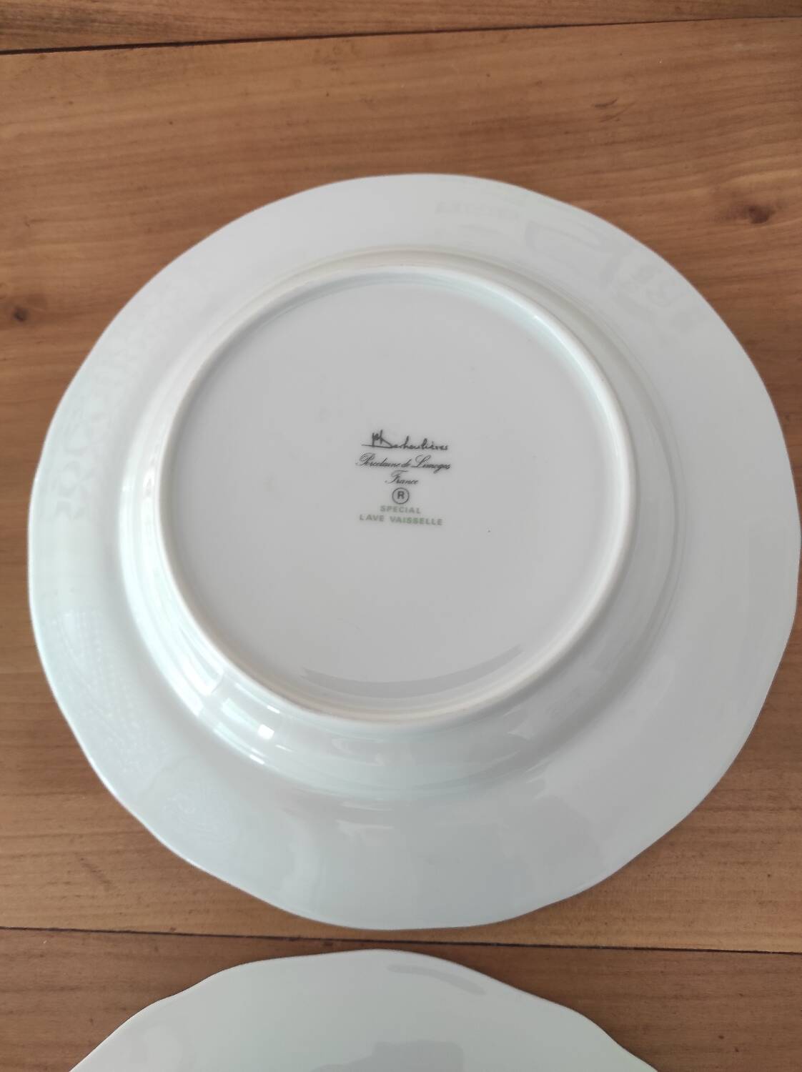 Set of 4 Limoges porcelain soup plates