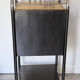 Vintage bedside table in brushed metal