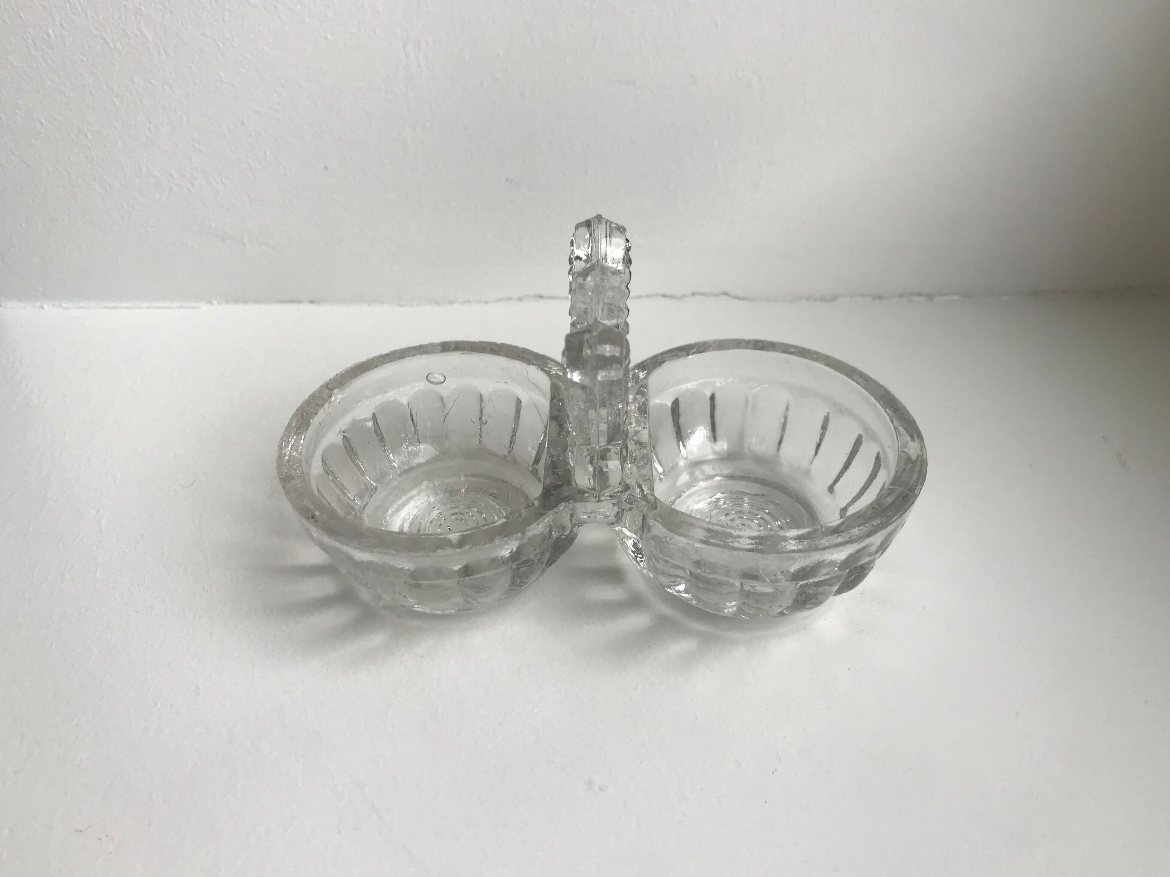 Trio of mismatched salt shakers in molded pressed glass 50s