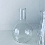 Set of three Pyrex glass chemistry bottles