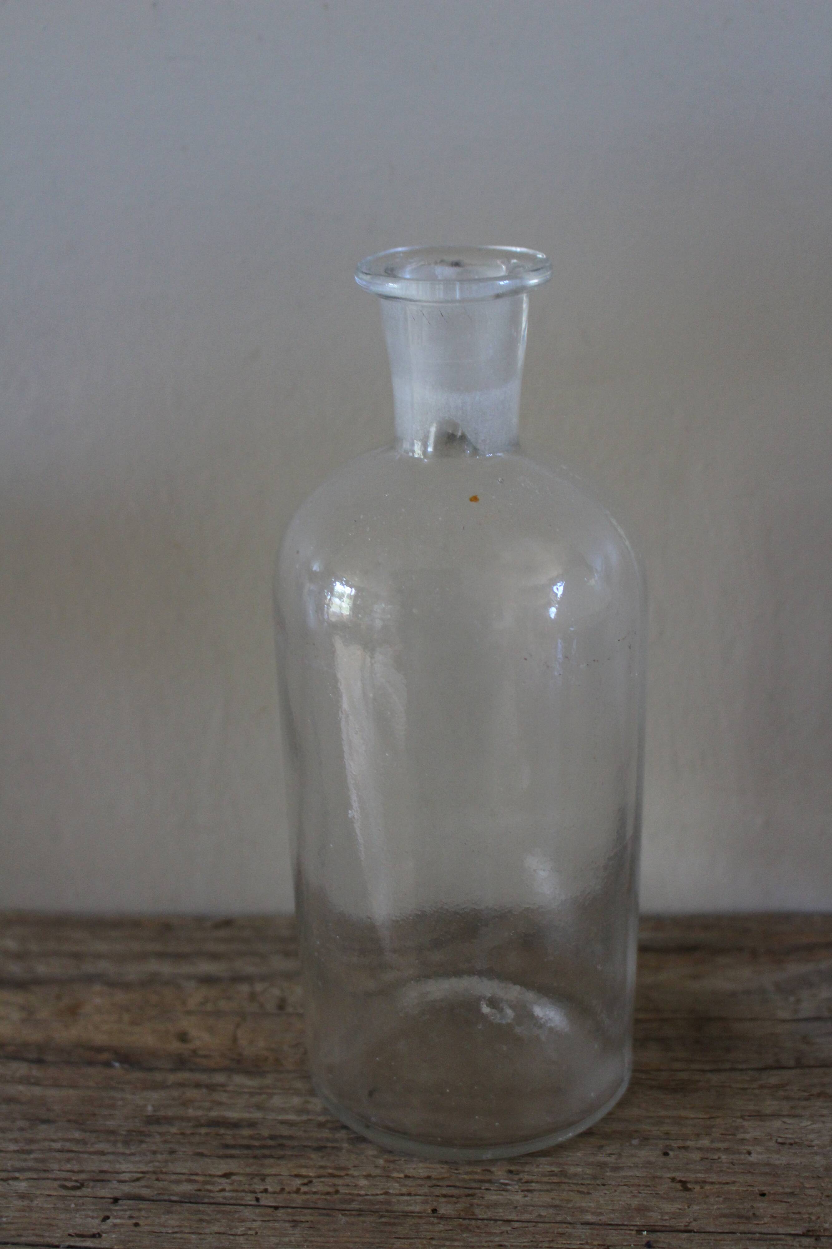 Clear glass bottle vase 500