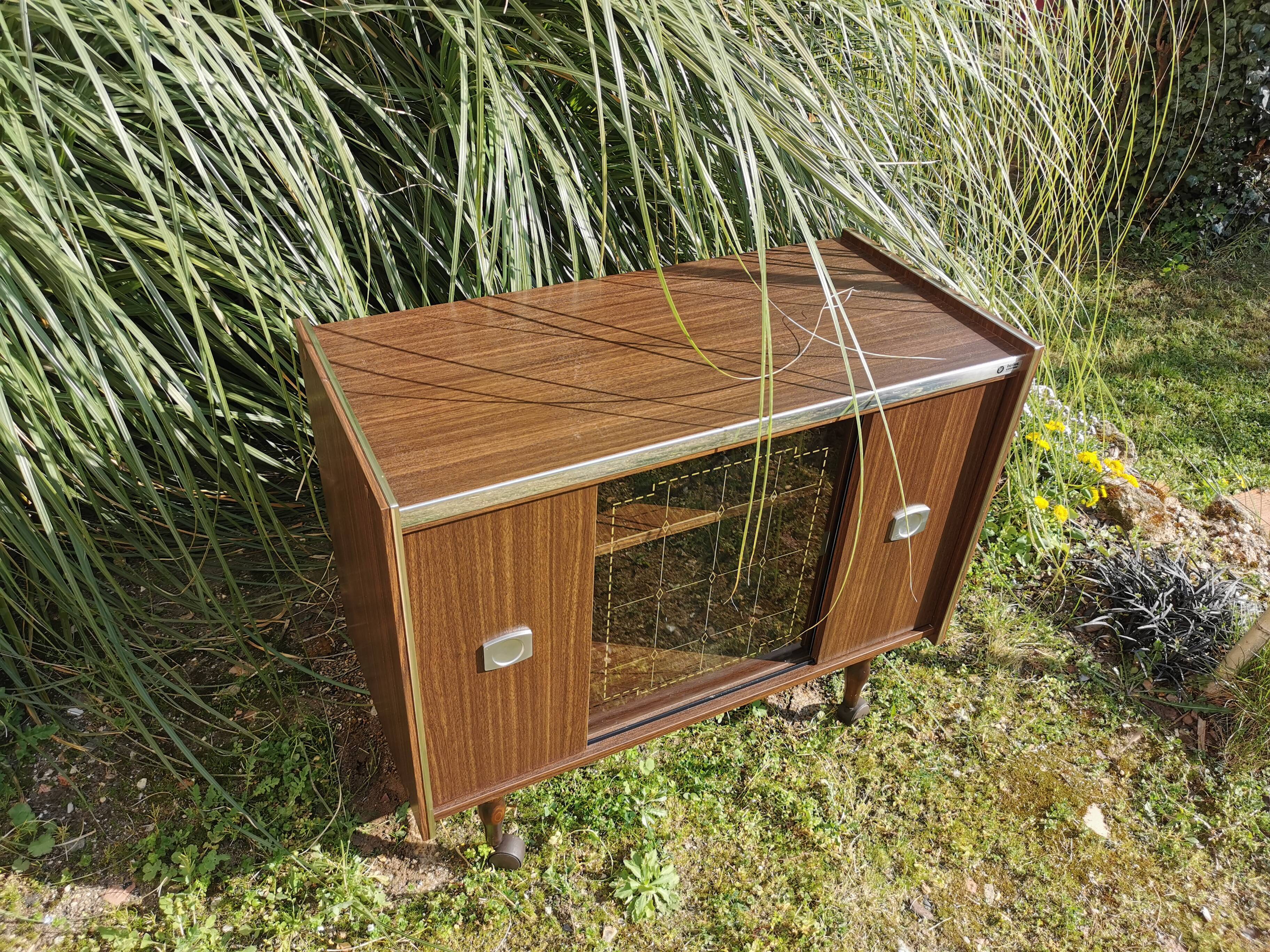 Furniture bar showcase with vintage wheels