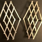 Paire de dessous de plat anciens extensibles métal argenté 1940