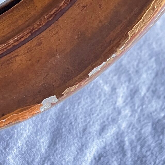 Witch's mirror with wood frame and curved ice