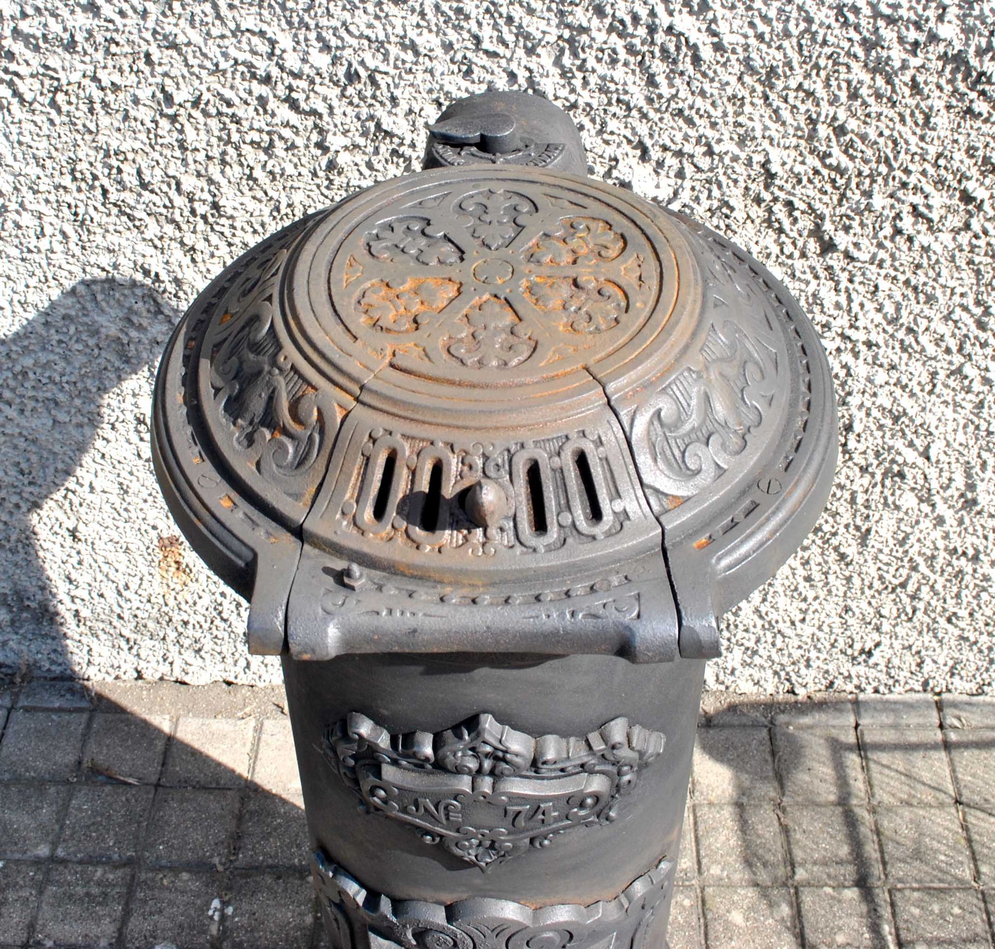 Antique decorative stove in black cast iron Germare charcoal