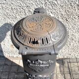 Poêle décoratif ancien en fonte noir Germare charbon bois