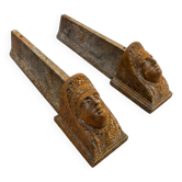 Pair of cast iron andirons from the 19th century.