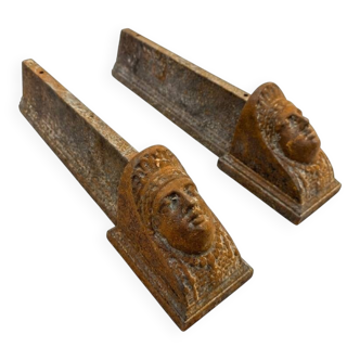 Pair of cast iron andirons from the 19th century.