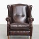 Fauteuil à oreilles de style anglais en cuir de vachette