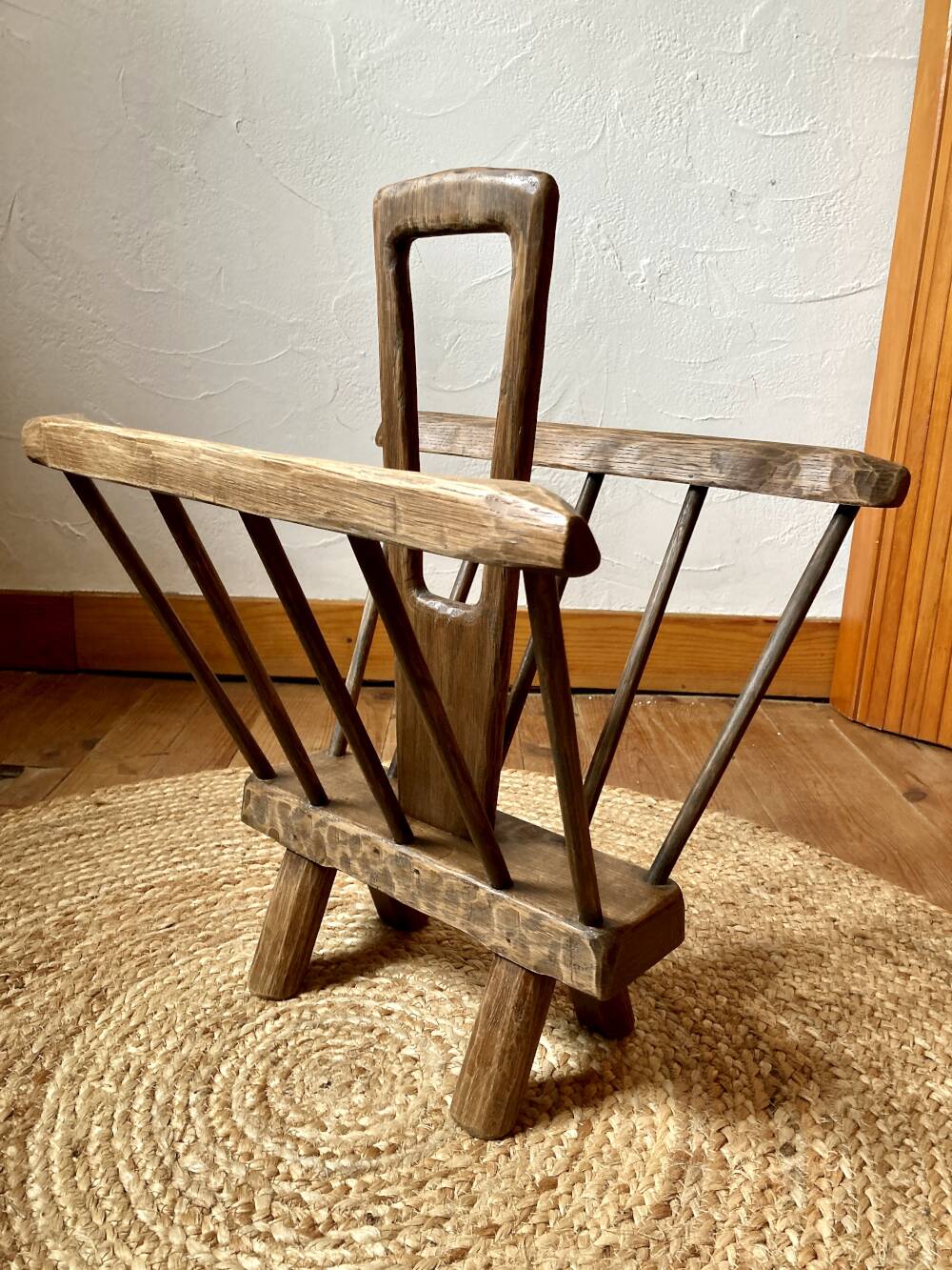 Brutalist magazine rack in the style of Jean Touret, 1950s.