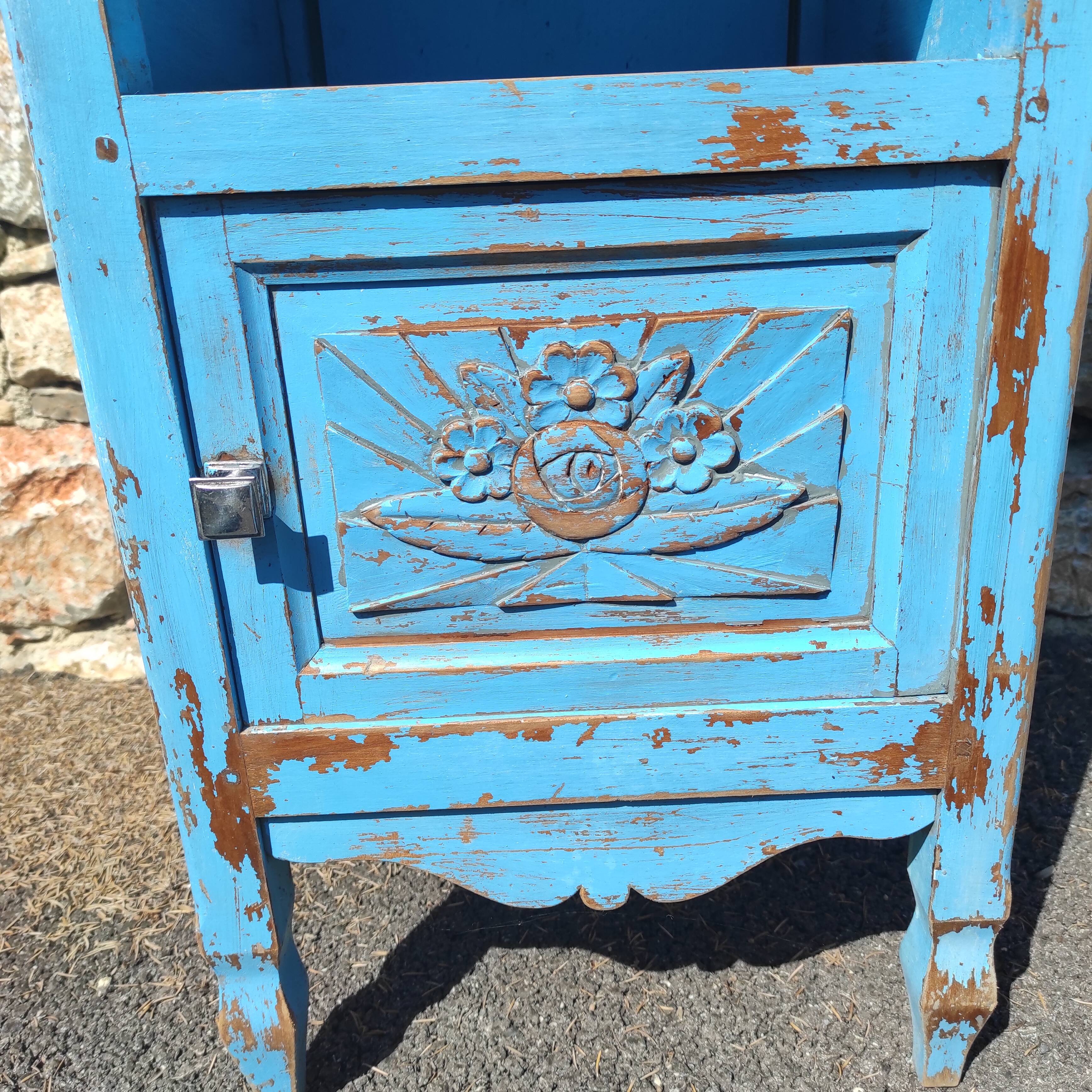 Old bedside table with 1 drawer and 1 door painted in lavender blue
