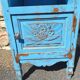 Old bedside table with 1 drawer and 1 door painted in lavender blue