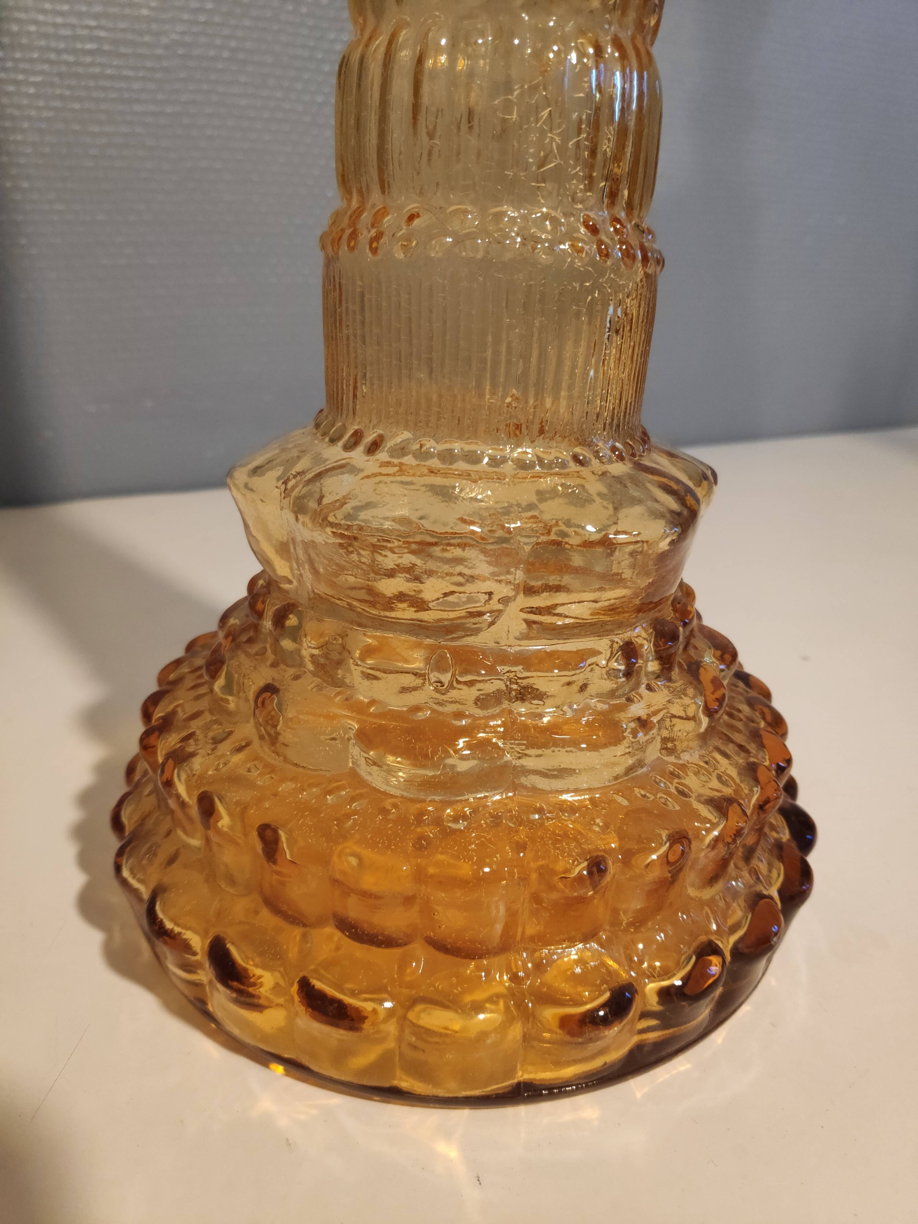 Pair of amber-coloured carafes