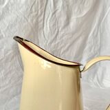 Vintage pitcher or jug in beige enamelled sheet metal