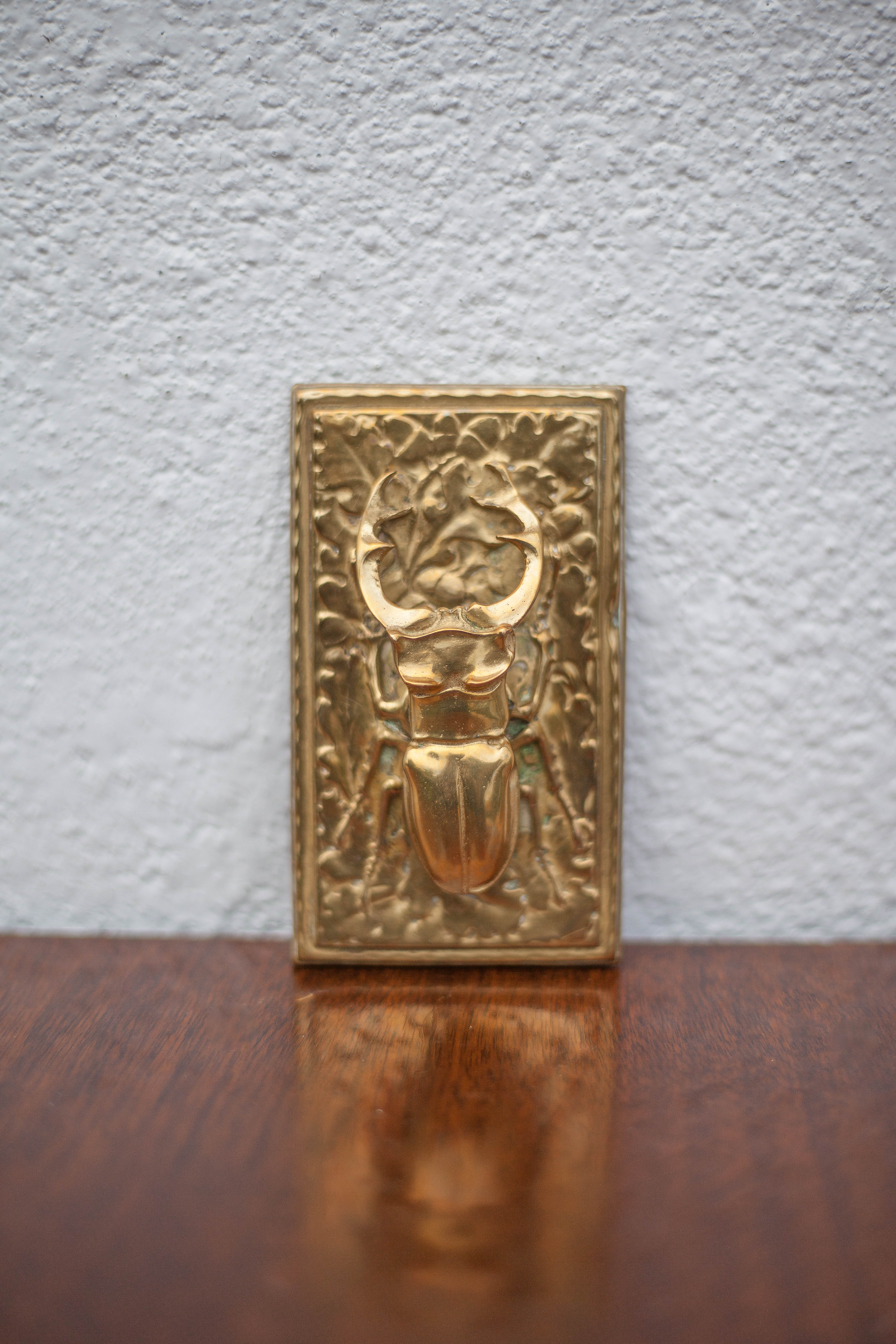 Scarab brass mail clip