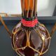 Vintage amber glass, brass and scoubidou carafe