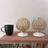 Pair of golden Scandinavian globe wall lights