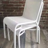 White woven resin garden chair