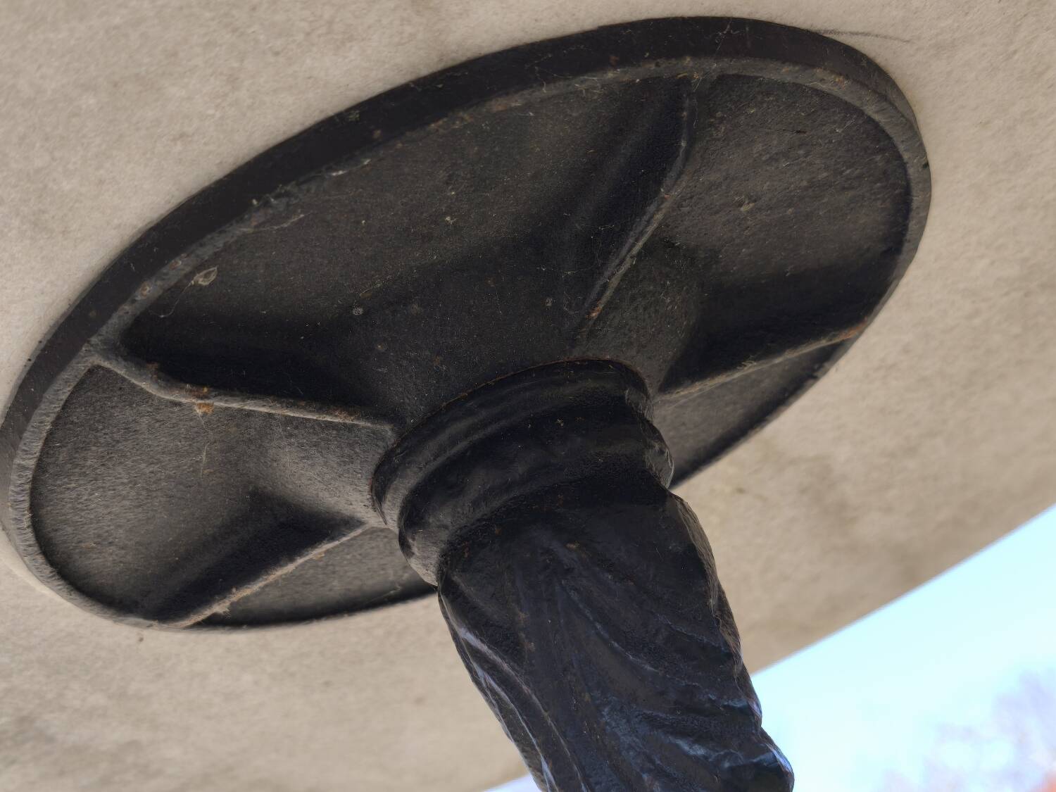 Marble bistro table with cast iron legs in Parisian café style