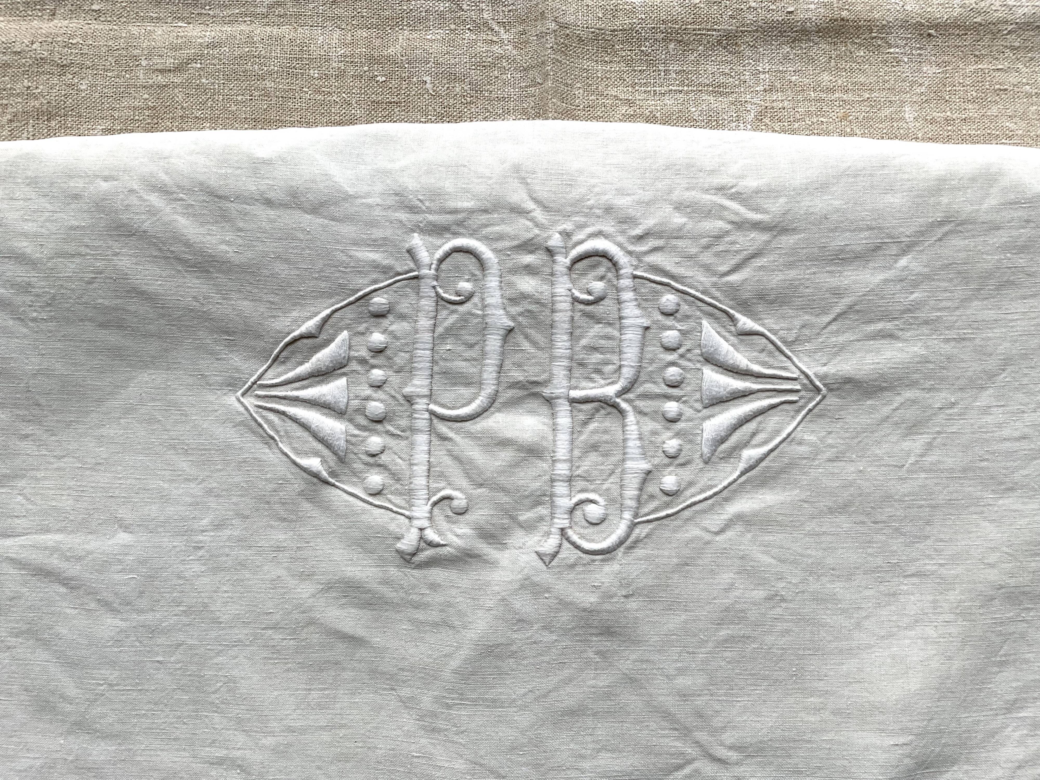 Old hand-embroidered linen sheet
