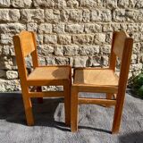 Two brutalist chairs from the 70s in golden oak