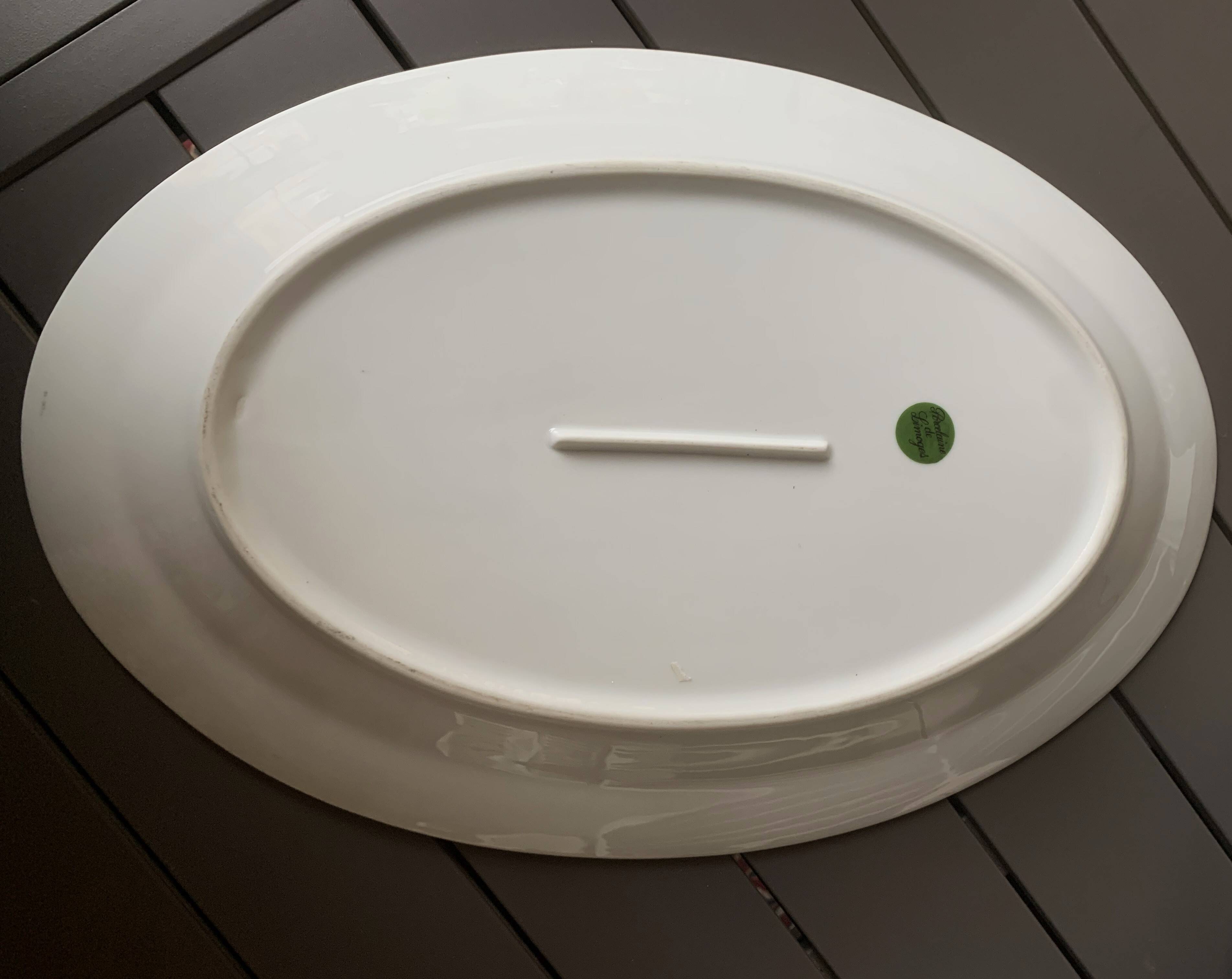 Fish service 7 pieces - 6 plates and 1 large dish - in porcelain from L.