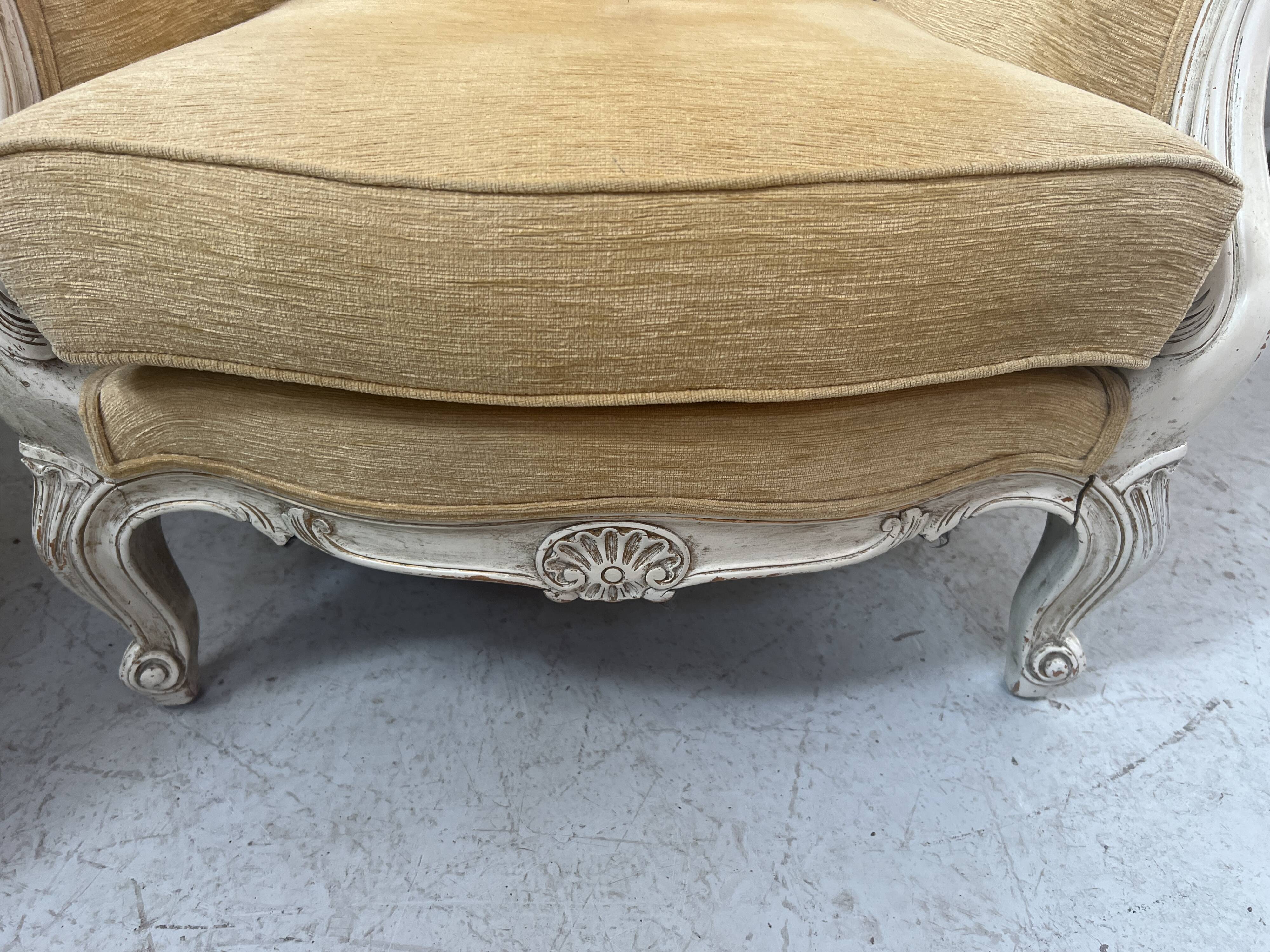 Pair of Louis XV style wing chairs in patinated beech, 20th century