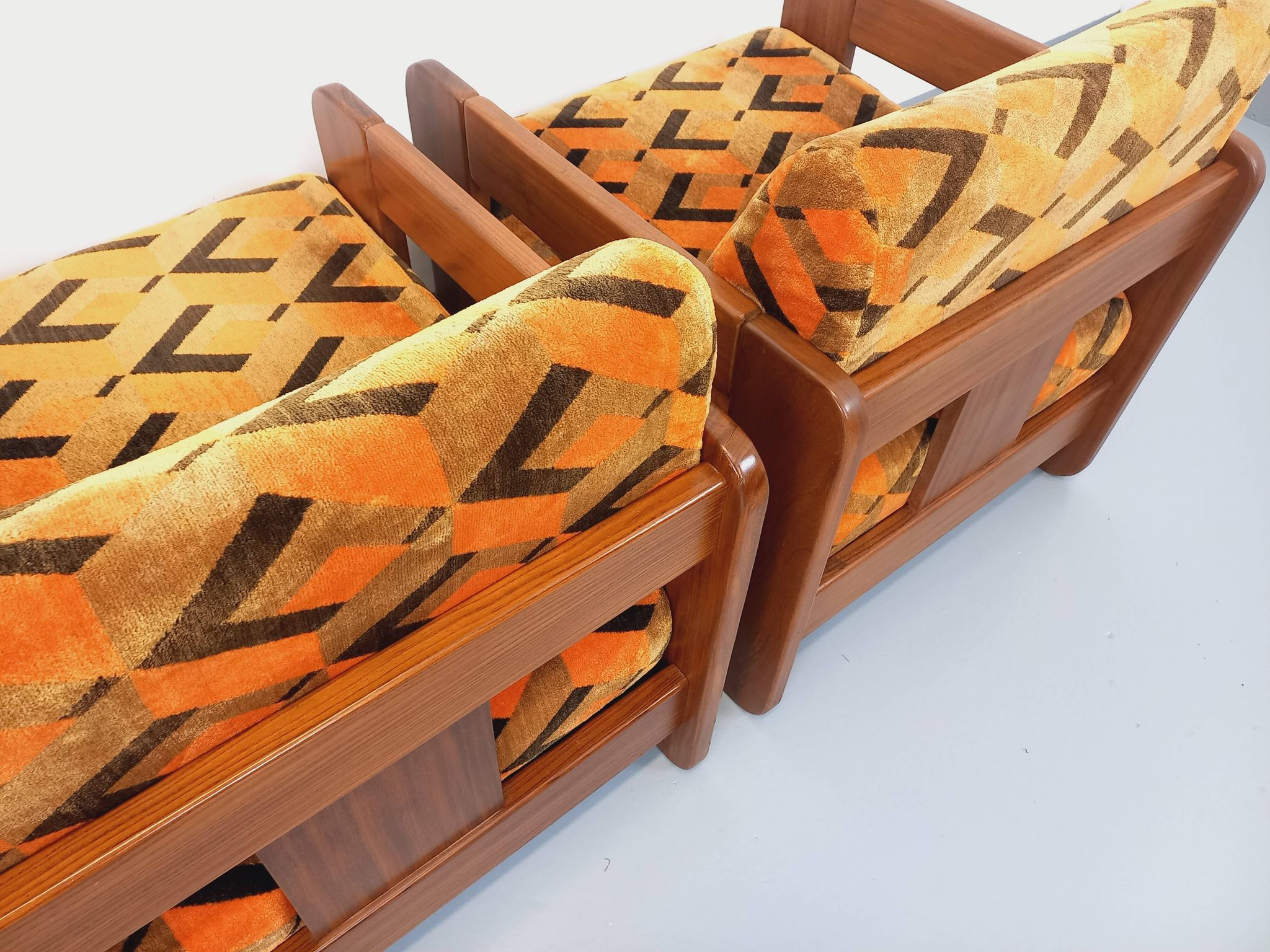 Pair of vintage walnut and velvet fabric sleigh armchairs from the 70s